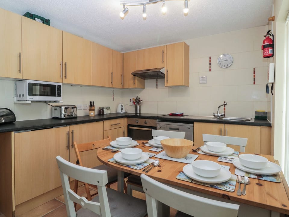 Fridge, microwave, toaster, cookware/dishes/utensils