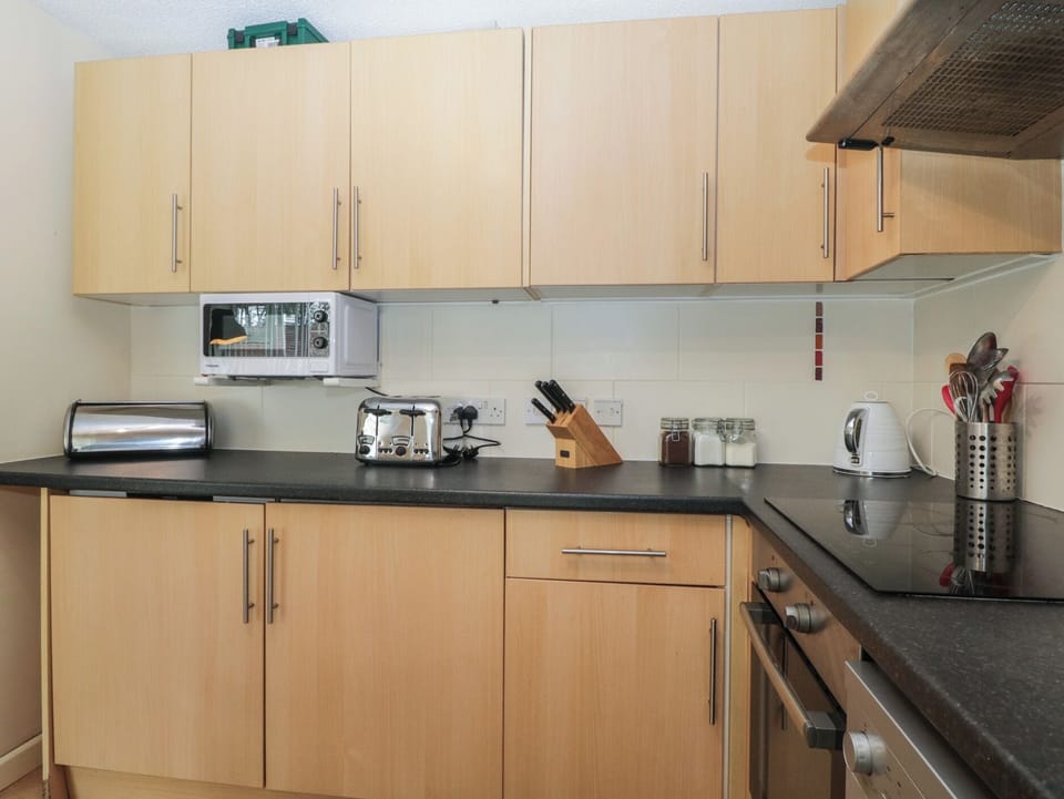 Fridge, microwave, toaster, cookware/dishes/utensils
