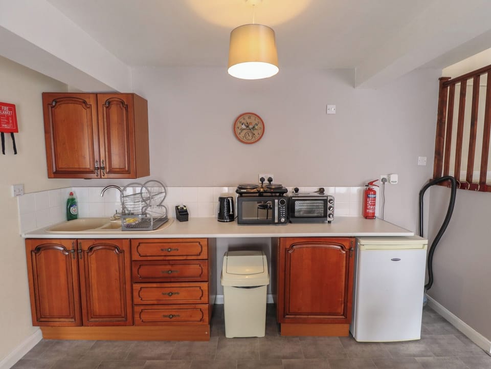 Fridge, microwave, cookware/dishes/utensils