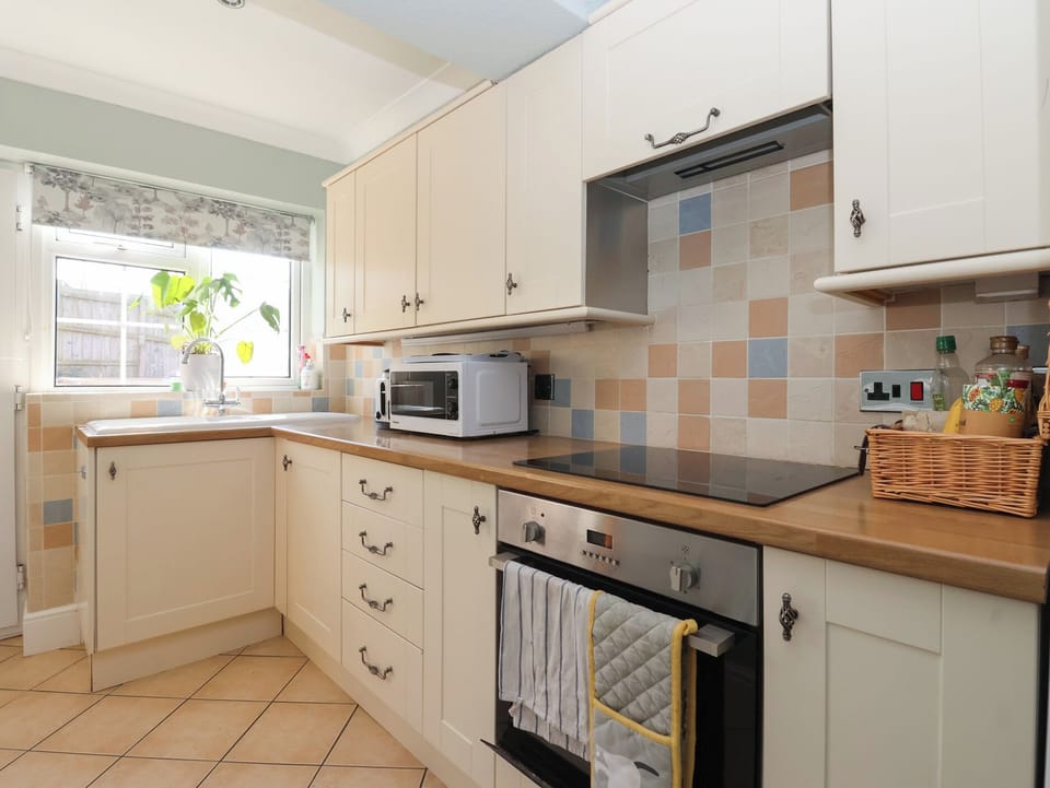 Fridge, microwave, toaster, cookware/dishes/utensils