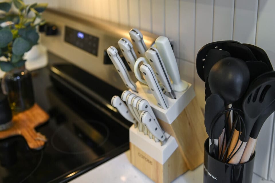 Designer knife set and all the kitchen utensils you`ll need.
