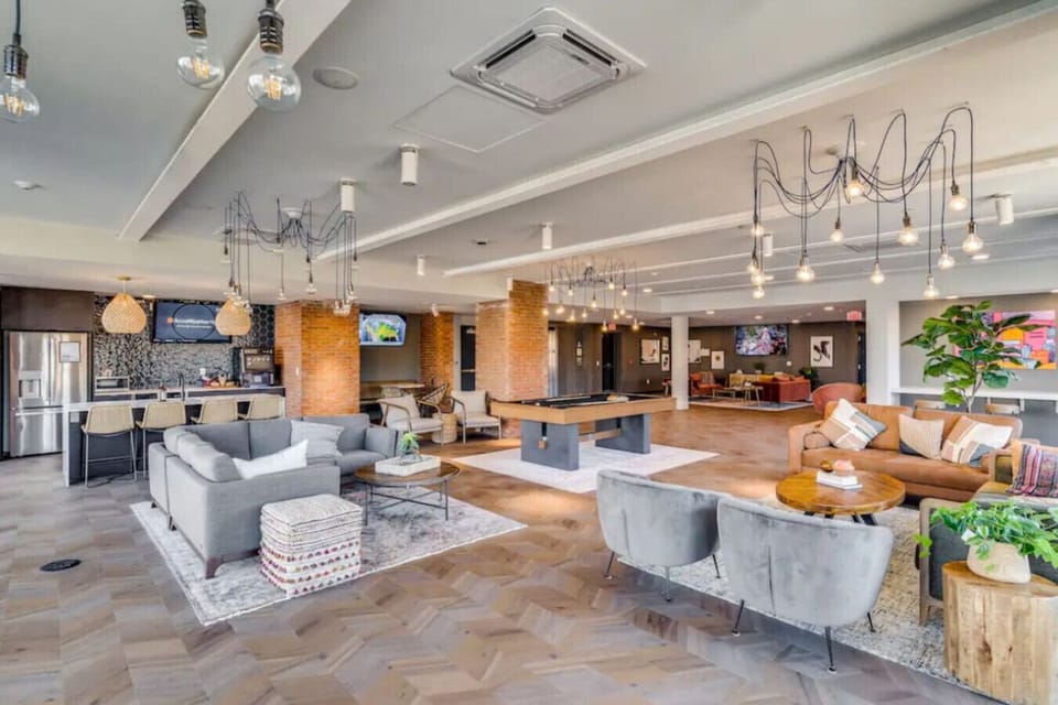 Spacious club room with lounge seating and cozy corners 🛋️