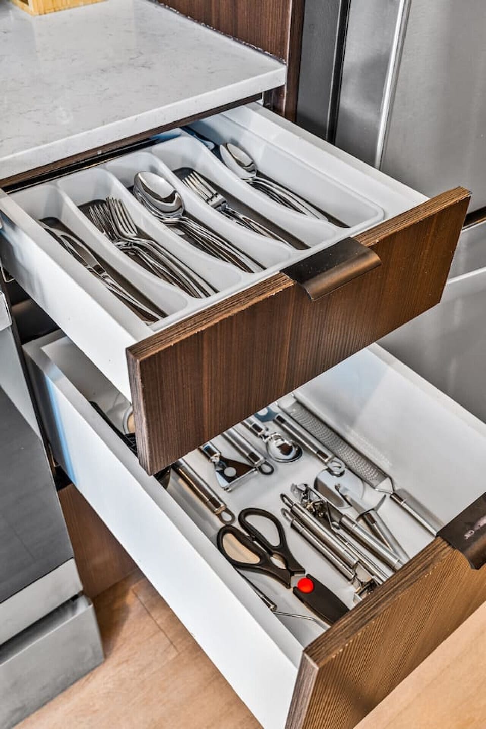 Fully stocked kitchen drawer with silverware and essentials 🍴