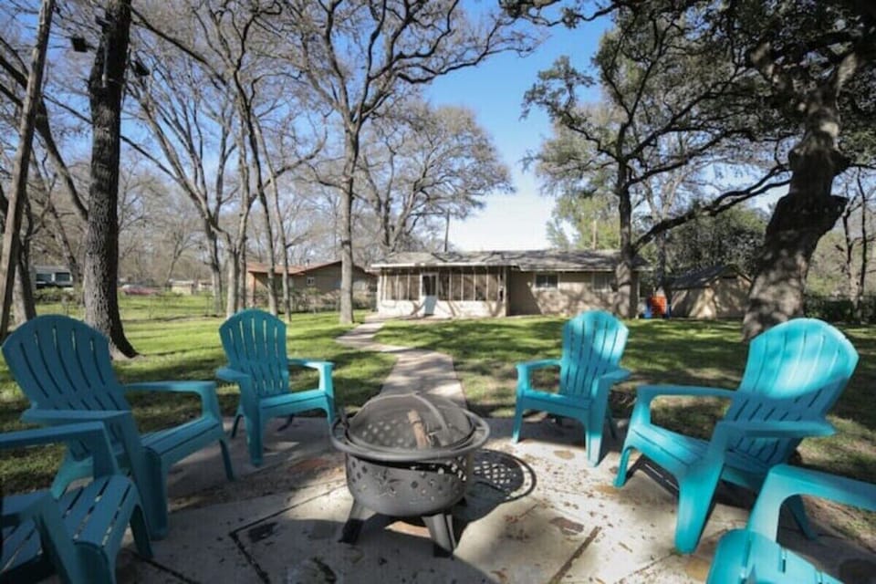 We love this backyard for grilling and sitting around the firepit