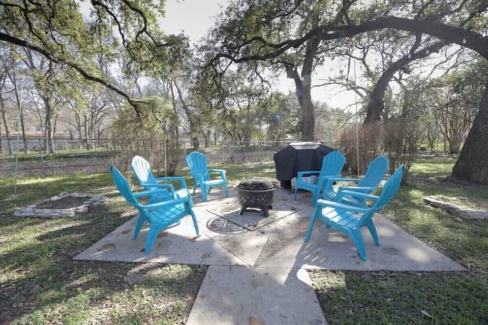 Fire pit and grill ready for a Saturday BBQ