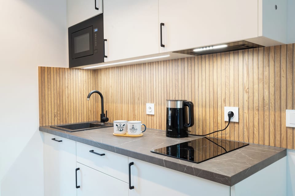 Comfort Bungalow, Garden View | Private kitchen | Fridge, microwave, stovetop, cookware/dishes/utensils