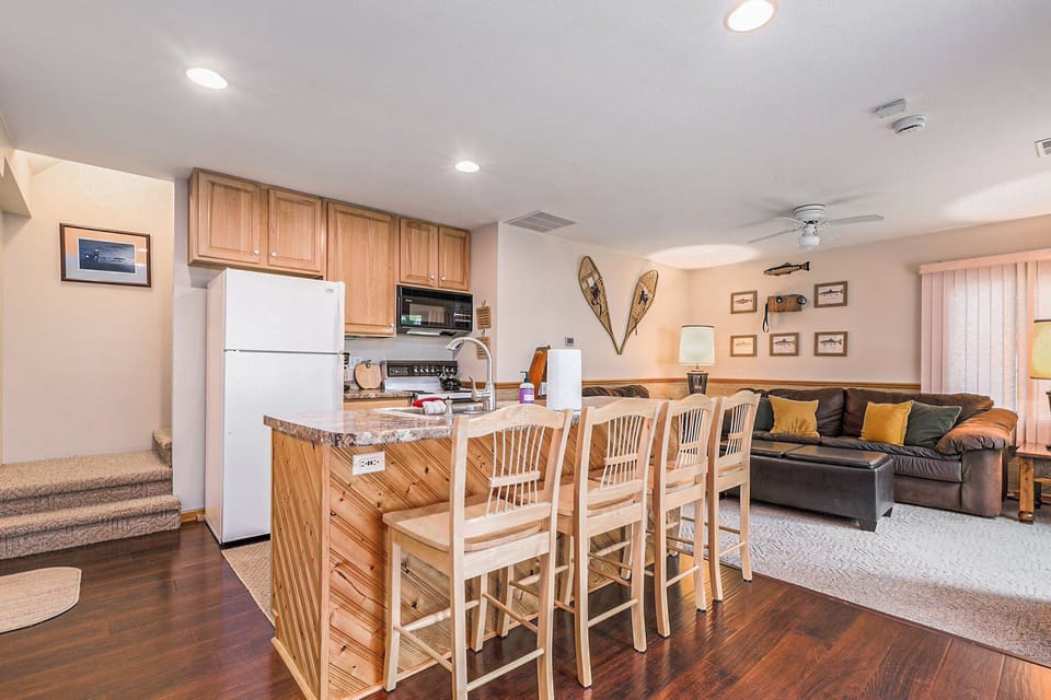 Second open concept kitchen with bar seating for 4