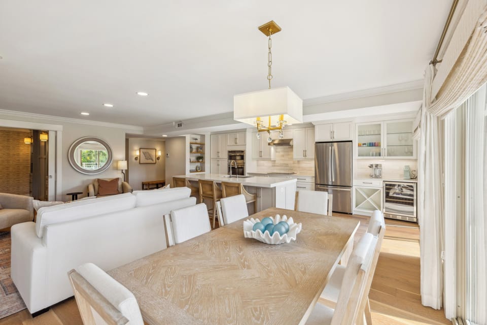 Dining table featuring 6 chairs and beautiful views.