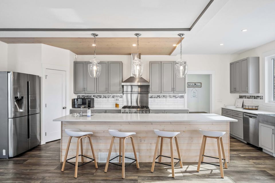 Spacious kitchen with island seating for 4—perfect for cooking and entertaining in the mountains.