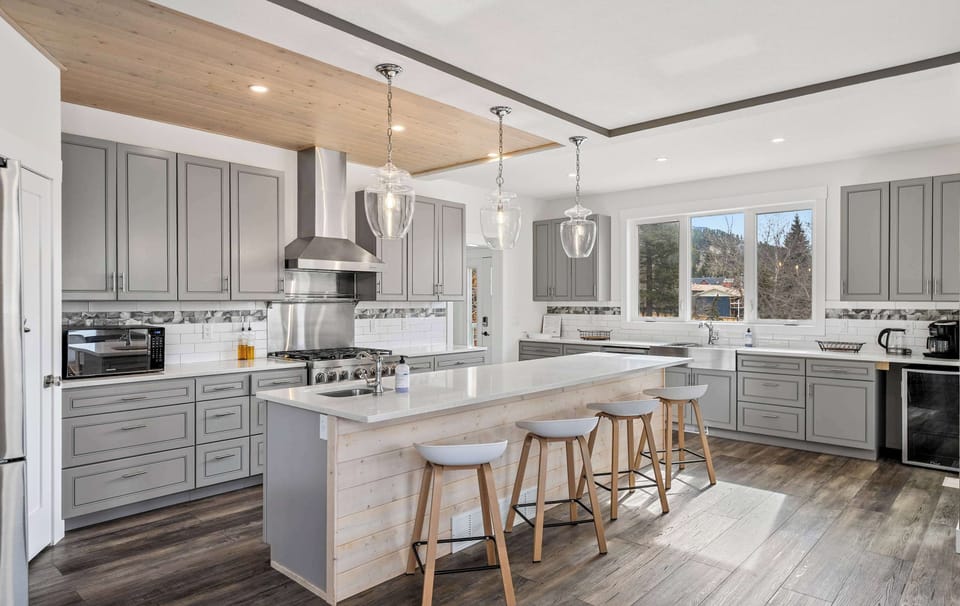 Cook up a feast in this vacation home’s modern kitchen, complete with kitchen essentials.