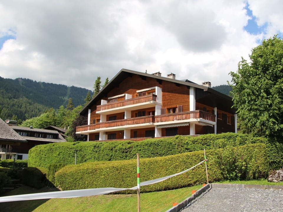 Building, Cloud, Sky, Plant, House, Land Lot, Tree, Slope, Urban Design, Wood