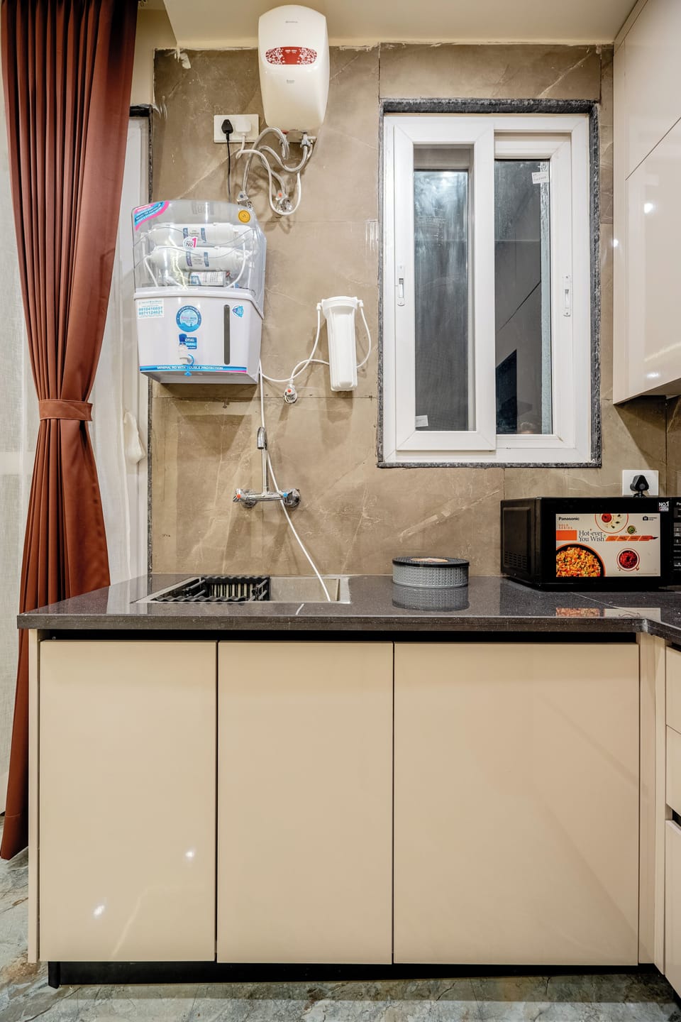 Microwave, stovetop, coffee/tea maker, electric kettle