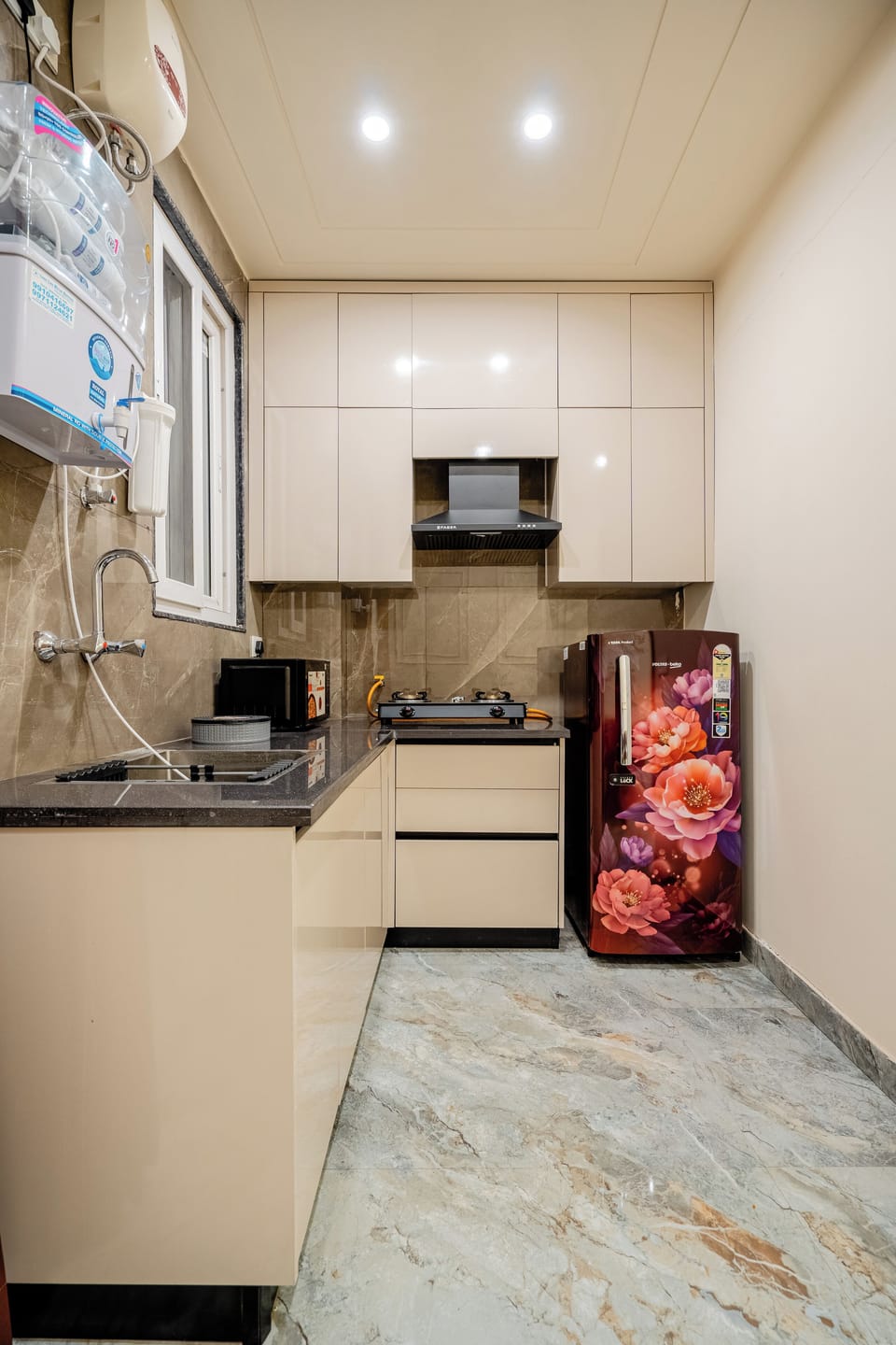 Microwave, stovetop, coffee/tea maker, electric kettle