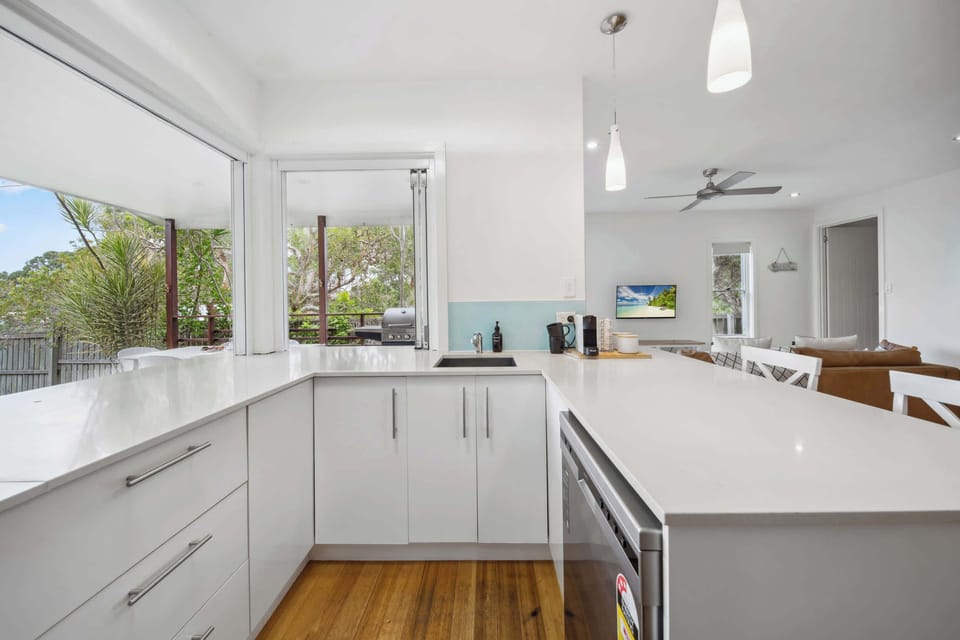 Beautiful timber flooring throughout the open living spaces
