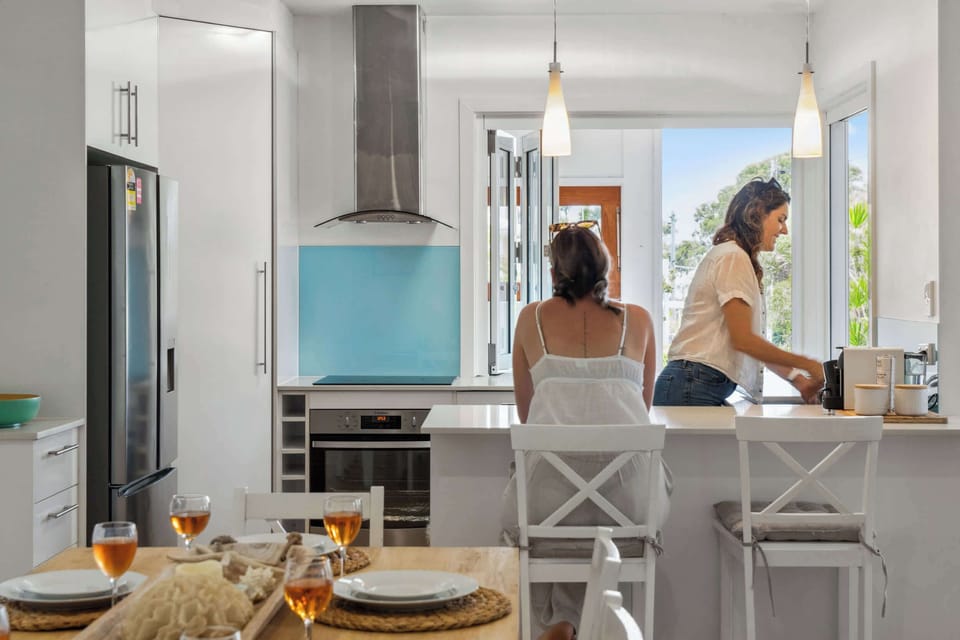 Modern kitchen with quality appliances and generous bench space