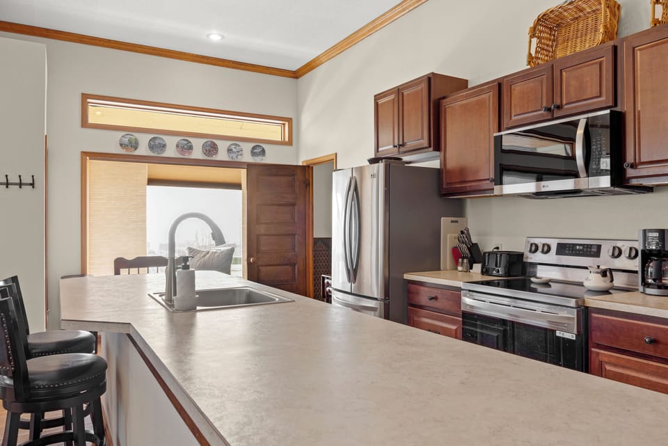 Kitchen with a half bath nearby.