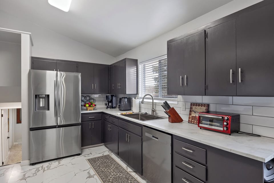 Kitchen with the downstairs adjacent.