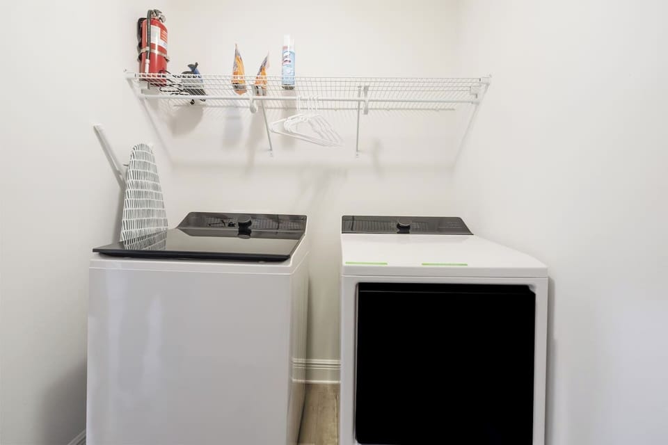 A spacious washer and dryer.