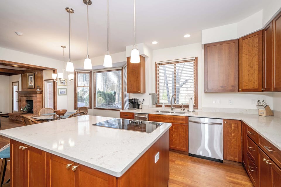 The chic, open kitchen offers ample space & every home comfort