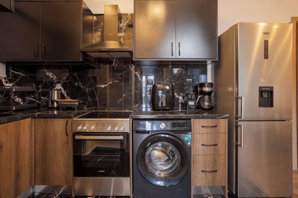 Comfort Apartment | Private kitchen | Full-size fridge, microwave, oven, stovetop