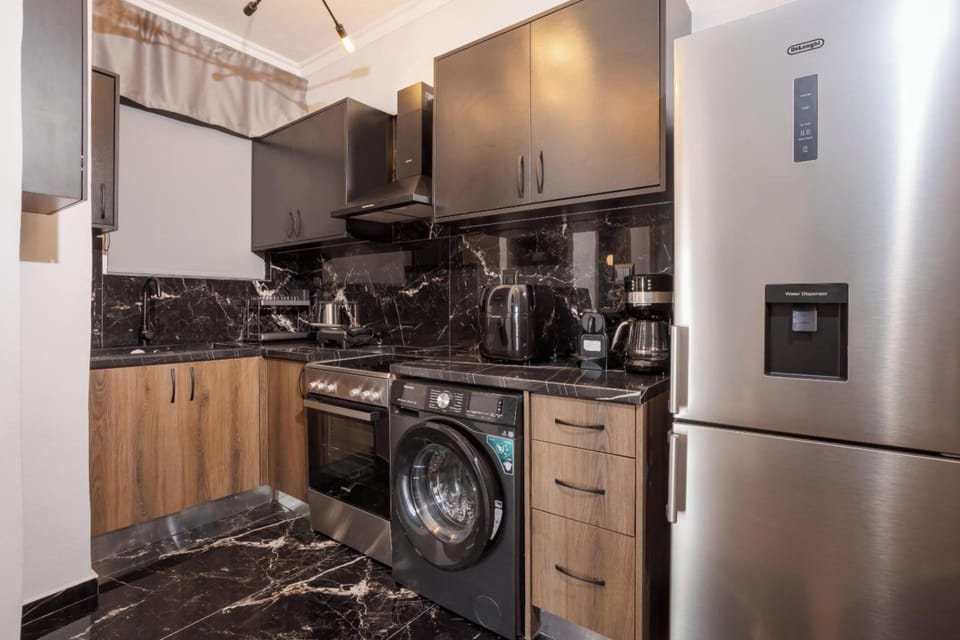 Comfort Apartment | Private kitchen | Full-size fridge, microwave, oven, stovetop