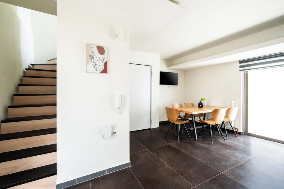 Junior Duplex, Balcony | Living area | Flat-screen TV