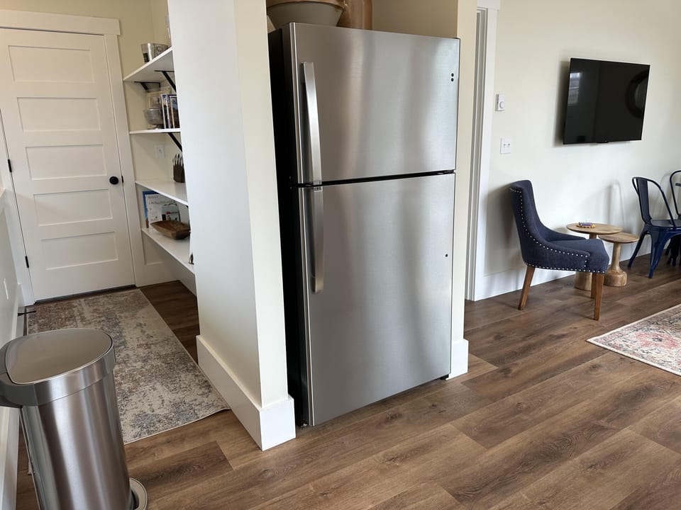 Very functional circular floor plan. The door on the left leads to the bathroom.
