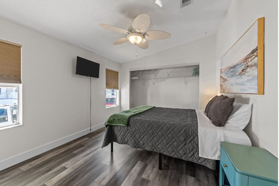 This serene primary bedroom is complete with an ensuite bathroom.