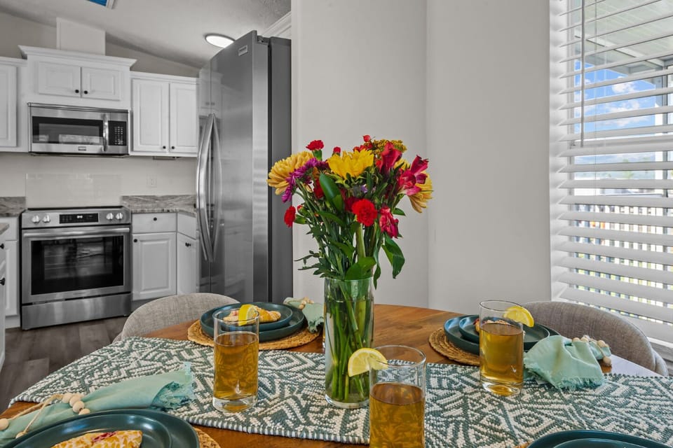 Bright mornings, colorful blooms, and the perfect place to enjoy a meal