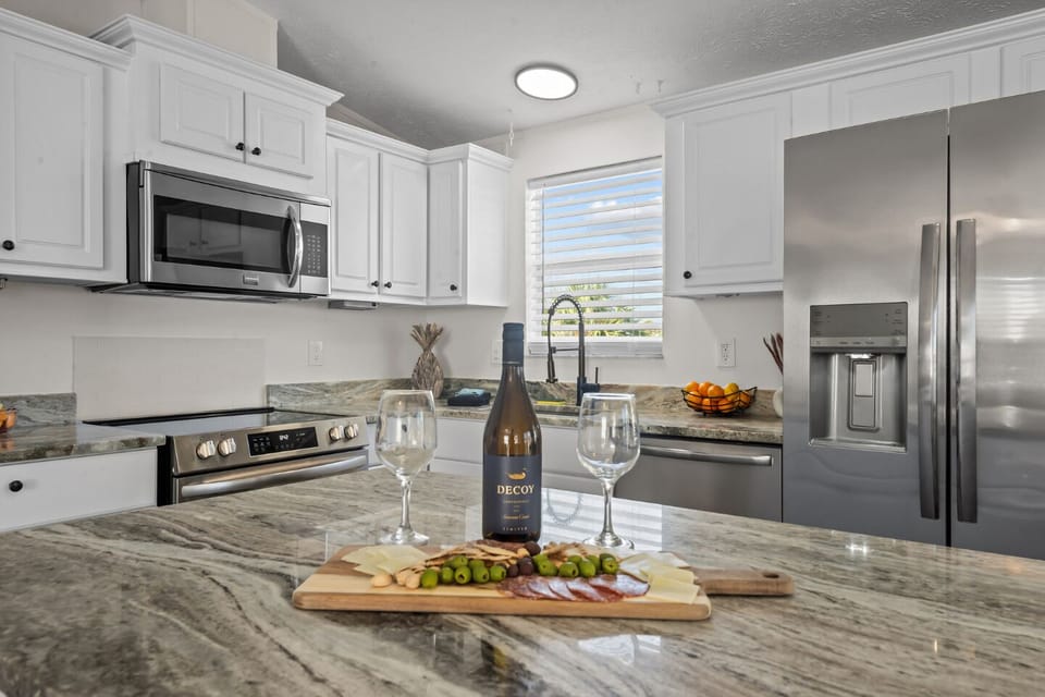 Whip up delicious meals with modern appliances and stunning granite countertops.