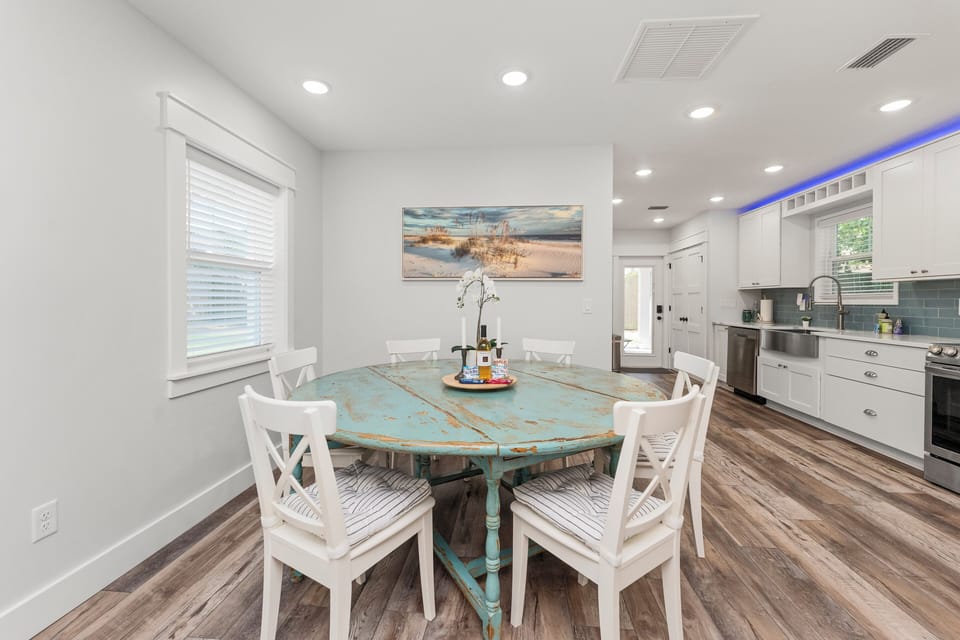 Enjoy meals or tackle work at the dining table comfortably seating six.