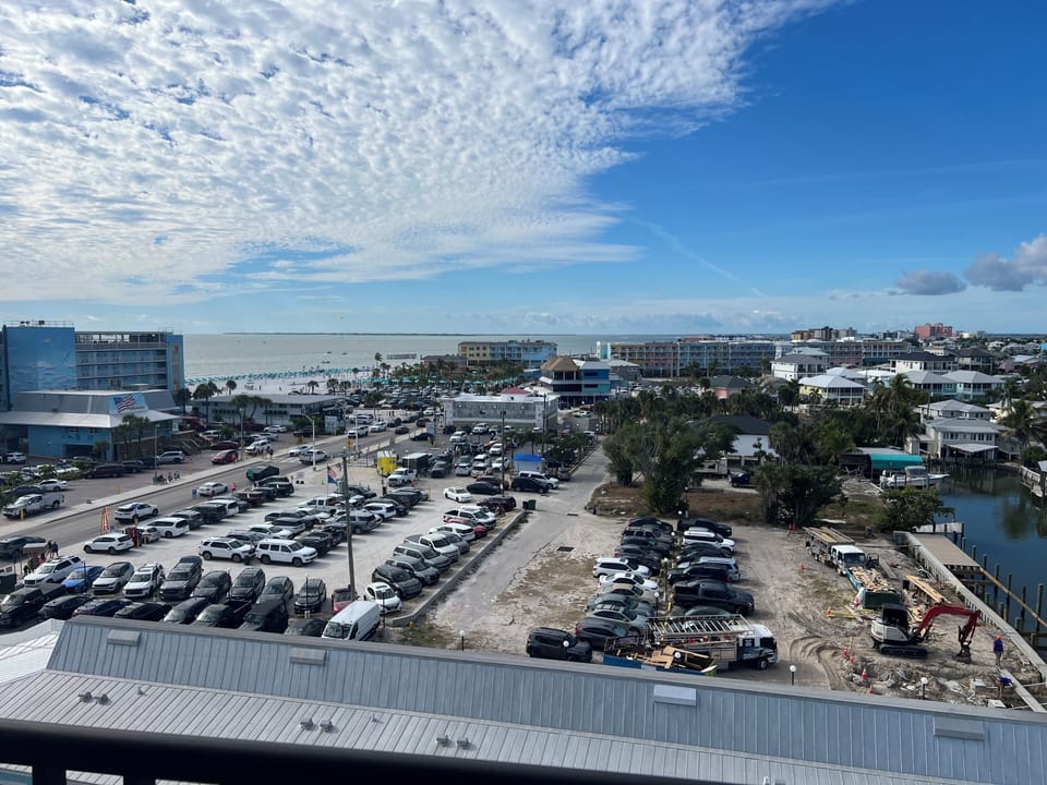 Side view from balcony. Beach, Pier, and sunsets are all in site!