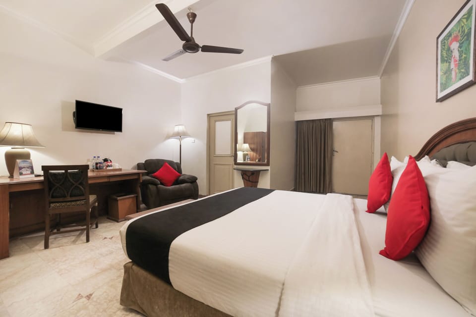 Deluxe Double Room, Courtyard View | Desk, laptop workspace, iron/ironing board, free WiFi