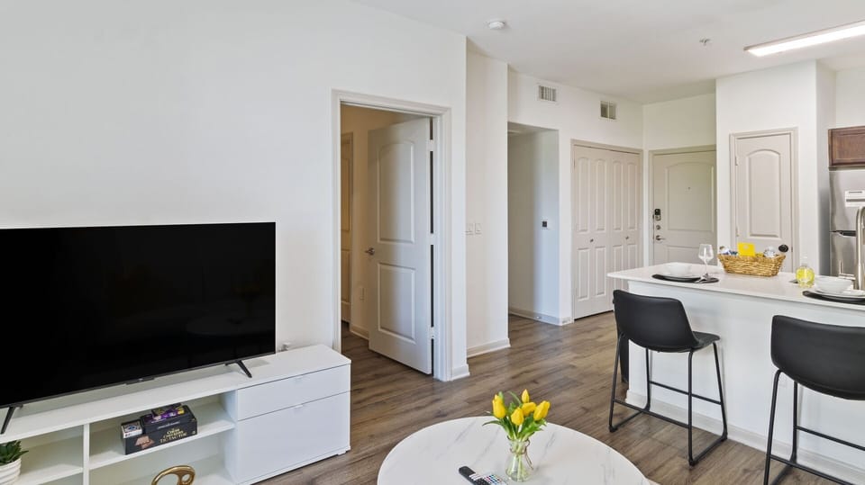 Living room Tv, coffee table, counter top, dinning chair