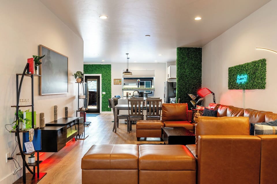 The open flow makes moving from lounge to kitchen feel easy.