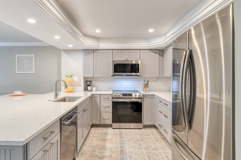The modern kitchen is fully stocked with everything you need to prepare your favorite foods and drinks.