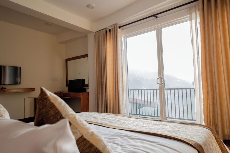 Superior Double Room, Balcony, Mountain View | Desk, laptop workspace, iron/ironing board