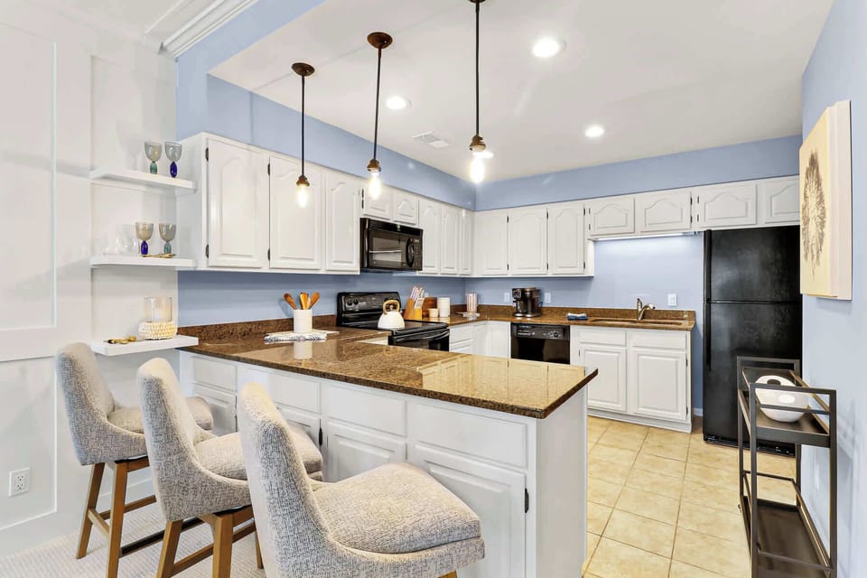 Kitchen Fully Stocked with cookware and dishware