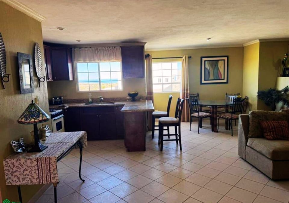 Gather everyone around the table. This dining room at Casa Bugambilia vacation rental in San Felipe Baja California gives you a dedicated space for meals, games, and planning the next day's adventure.