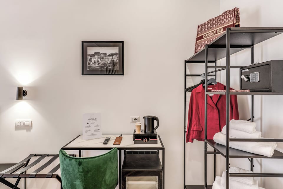 Deluxe Room, City View | In-room safe, desk, laptop workspace, blackout drapes