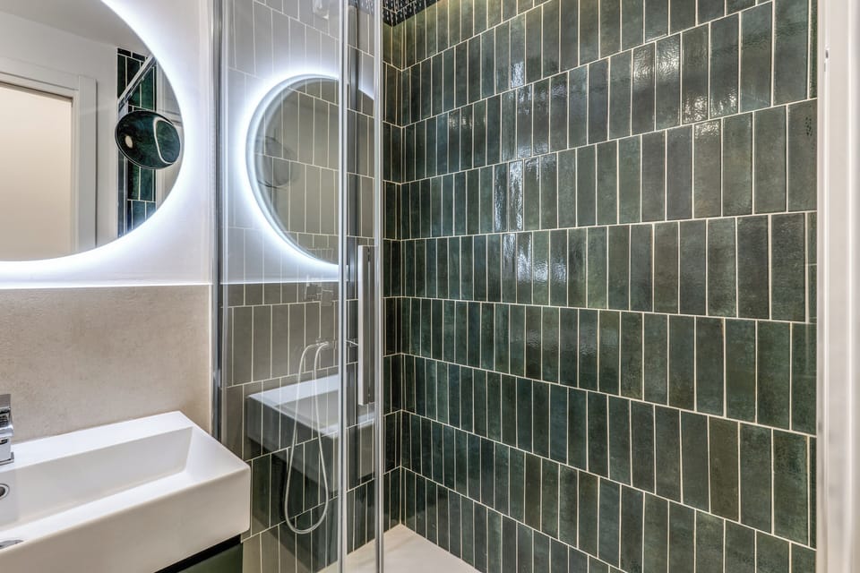 Deluxe Room, City View | In-room safe, desk, laptop workspace, blackout drapes