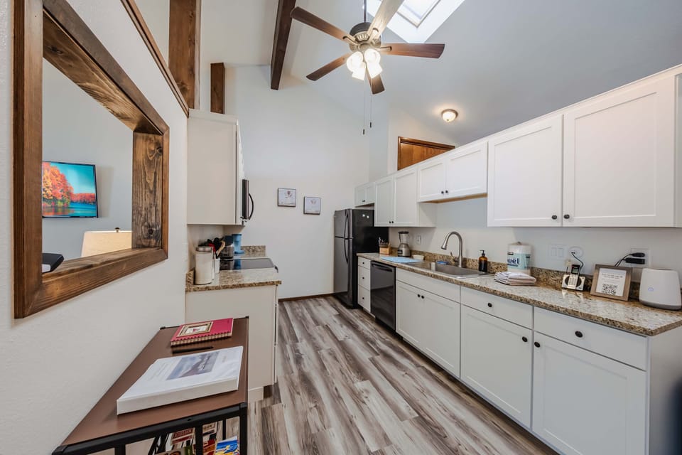 Townhome, Multiple Beds, Patio, Mountain View (Glacier Vista Golf Getaway) | Private kitchen | Fridge, microwave, oven, stovetop