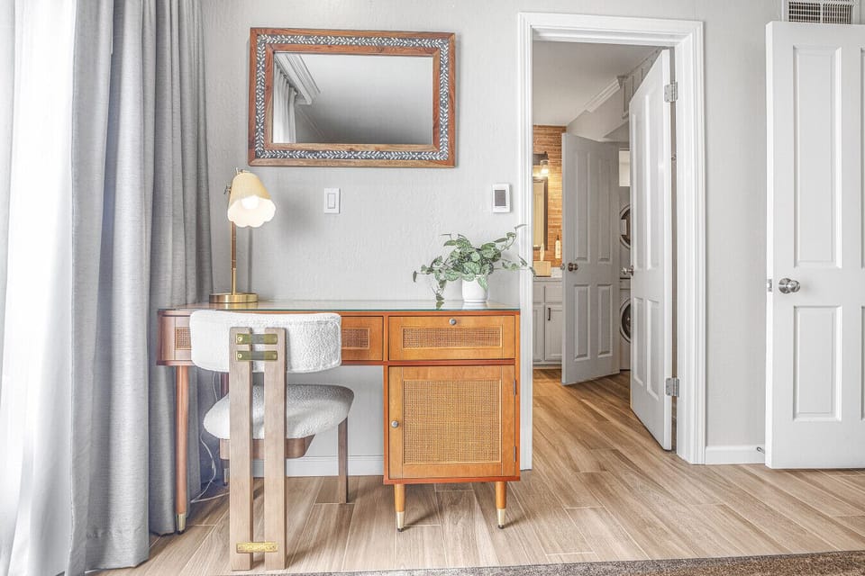 Whether you`re working remotely or writing postcards home, this cozy workspace offers both style and function.