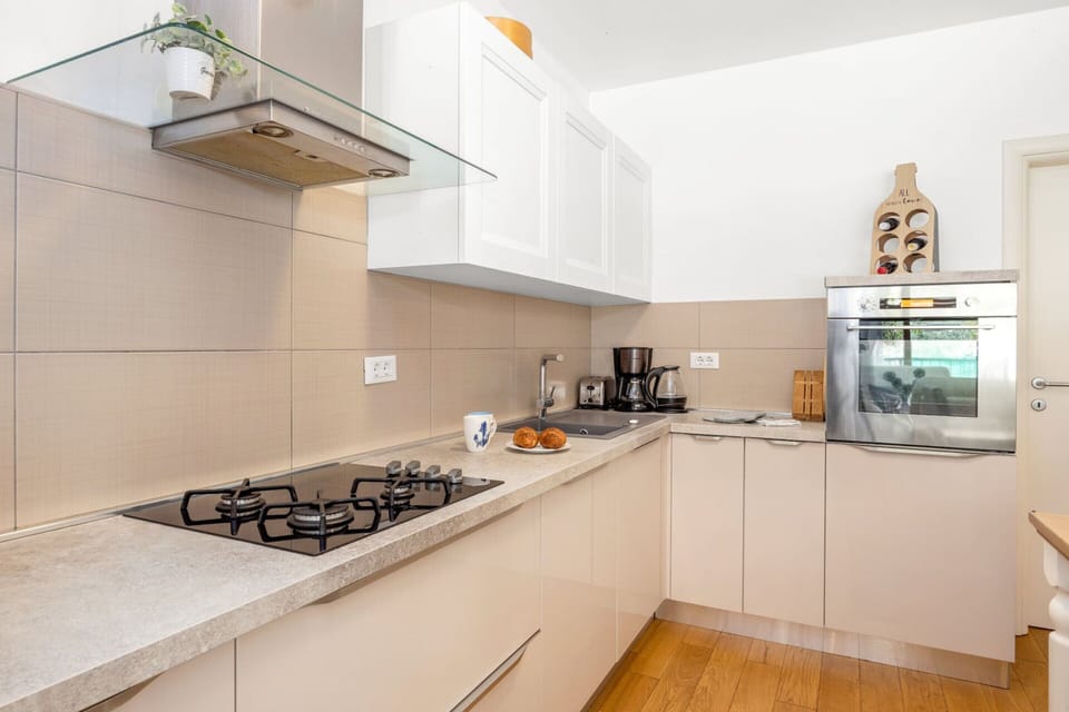 Villa | Private kitchen | Coffee/tea maker, highchair