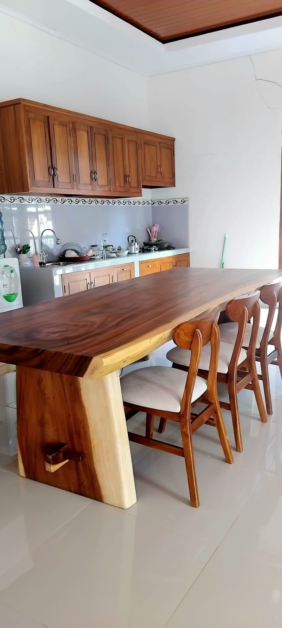Shared fridge, microwave, cookware/dishes/utensils, dining tables