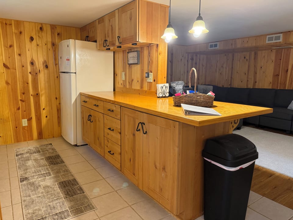 Large counter for food preparation, lots of storage underneath for all you bring