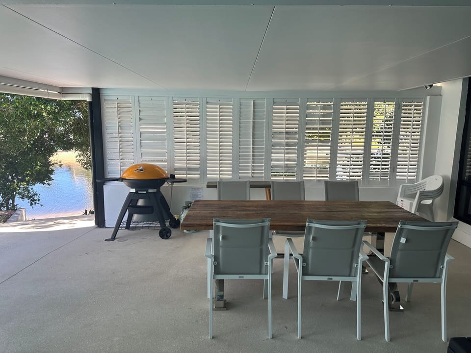 Our spacious outdoor undercovered BBQ with a stunning 42m water view!