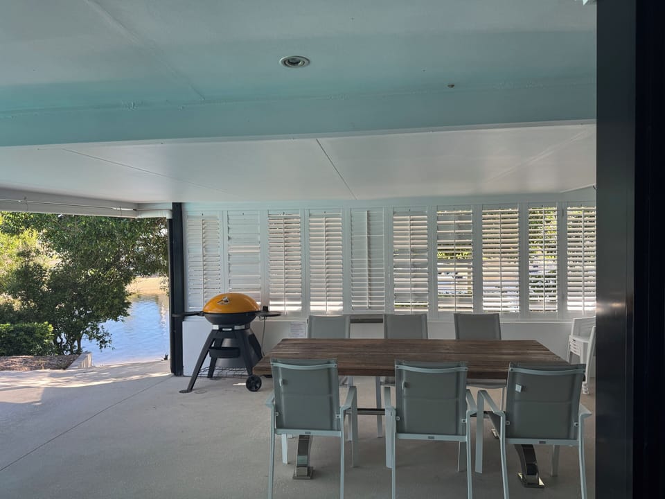 Our spacious outdoor undercovered BBQ with a stunning 42m water view!