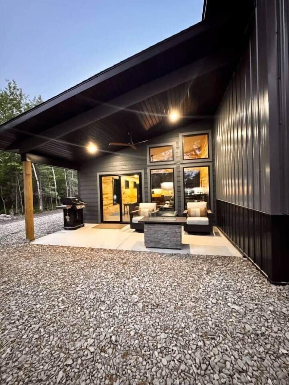 Covered private porch complete with sunset views, grill, fireplace and patio furniture.