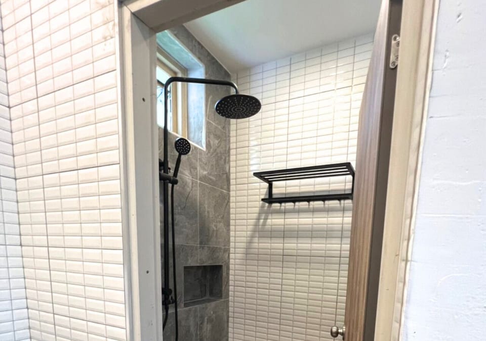 Deluxe Room, 1 Bedroom, Pool View | Bathroom | Shower, free toiletries, slippers, towels